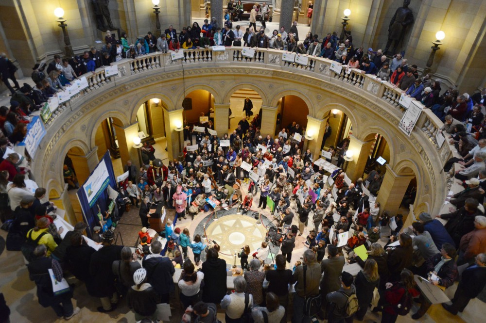 Hundreds rally at the state Capitol to support sustainable energy Monday, April 22, 2013, in St. Paul. University students attended the rally in support of renewable energy bills.