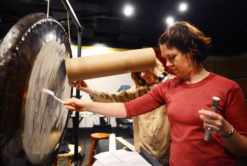 Shannon Wettstein and Patti Cudd of Zeitgeist rehearses Mikrophonie on Tuesday, April 2, 2013, at Studio Z in St. Paul. A sound collage created with a variety of tools, the piece is centered around one gong. 
