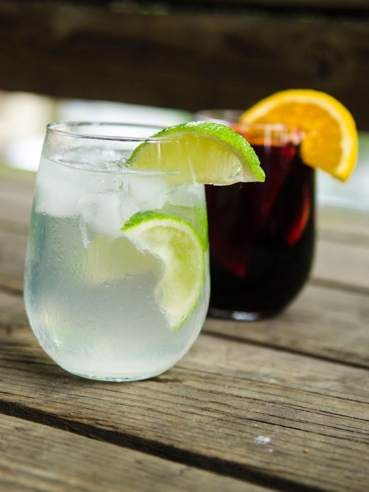A caipirinha and a sangria make a great couple for summer cocktails.