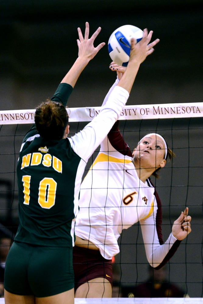 Minnesota middle blocker Tori Dixon spikes during a game against North Dakota State Monday at the Sports Pavilion. Dixon had 15 kills with two aces and threes block assists.