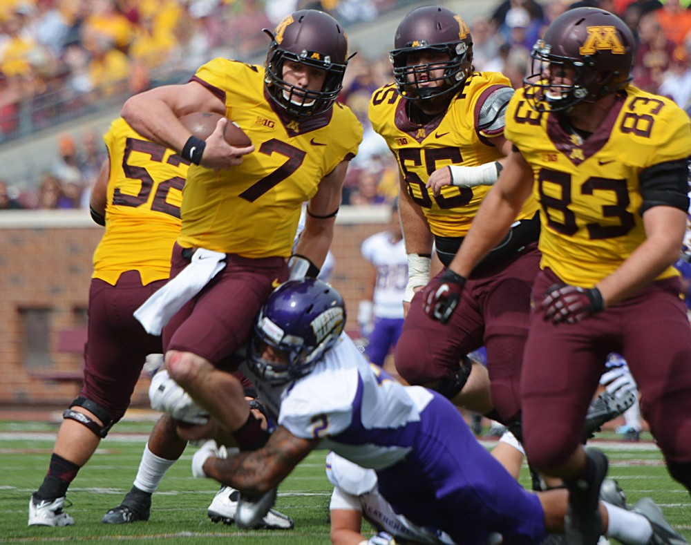 Minnesota quarterback Mitch Leidner protects the ball against Western Illinois on Saturday at TCF Bank Stadium. Leidner stepped in after Philip Nelson was injured in the first quarter.