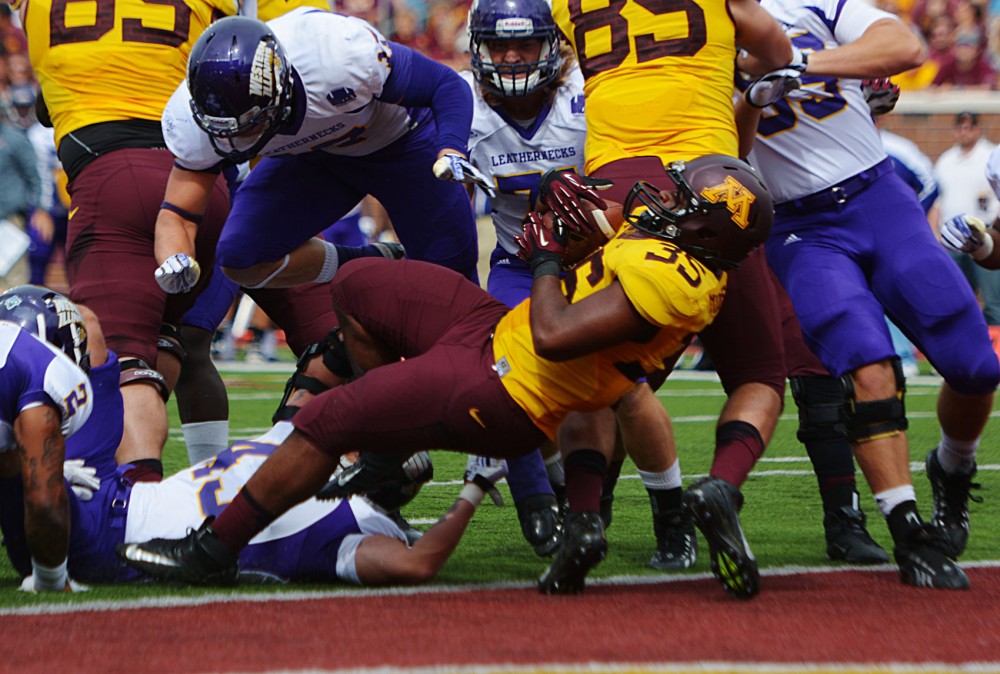 Minnesota running back Rodrick Williams Jr. scores the first touchdown against Western Illinois at TCF Bank Stadium. Minnesota led 7-6 going into the second half.