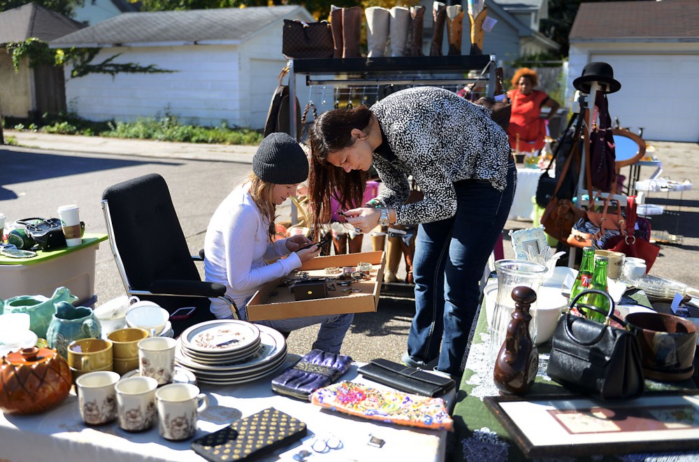 Sellers at Flamingos Divine Finds in Minneapolis do business on Sunday at a seasonal flea market. Outdoor markets like this have finally been legalized in the last year. 