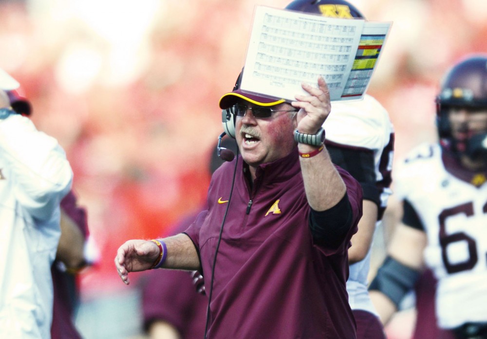 Minnesota head coach Jerry Kill expresses his discontent with a review of a Gophers touchdown against Wisconsin on Oct. 20, 2012.