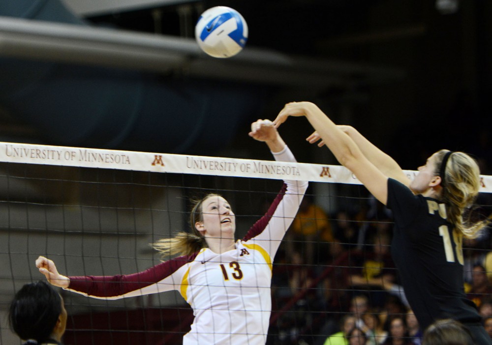 Gophers senior outside hitter Ashley Wittman sets up for a spike against Purdue on Sunday at the Sports Pavilion.