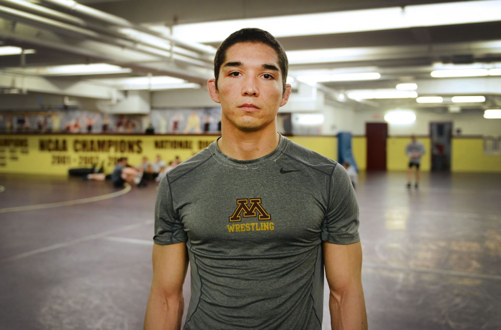 Gopher wrestler Conrad Rangell spent five years playing professional paintball before returning to school and becoming a part of the University in fall 2012.