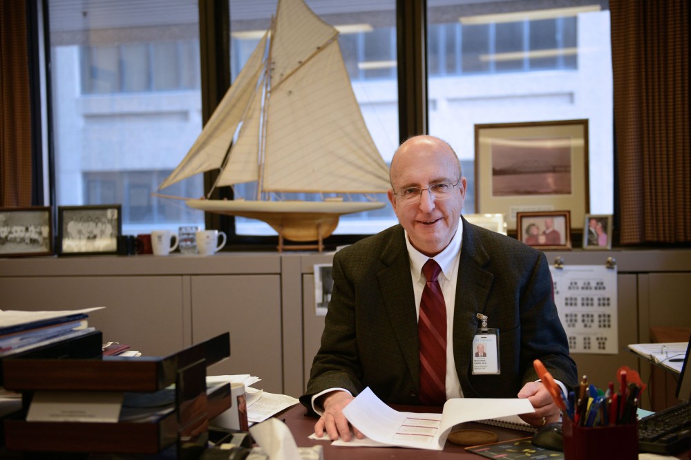 University professor and head of the University of Minnesota Department of Family Medicine and Community Health Macaran Baird at his office in Weaver-Densford Hall on Tuesday. Dr. Baird recently won a battle with cancer and is back at work. 
