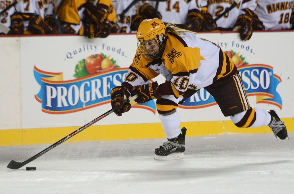 Minnesota forward Kelly Terry steals the puck on Friday at TCF Bank Stadium. Gophers won the game against Minnesota State Mavericks 3-0.