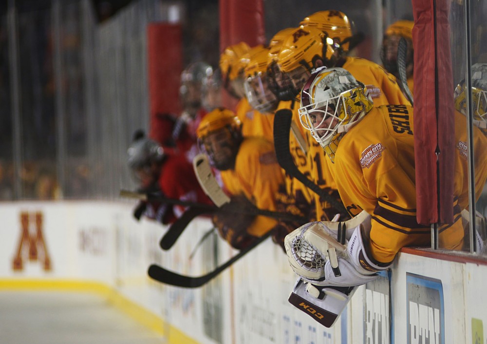 Minnesota mens hockey team watch the game against the Buckeyes on Friday at TCF Bank Stadium. 