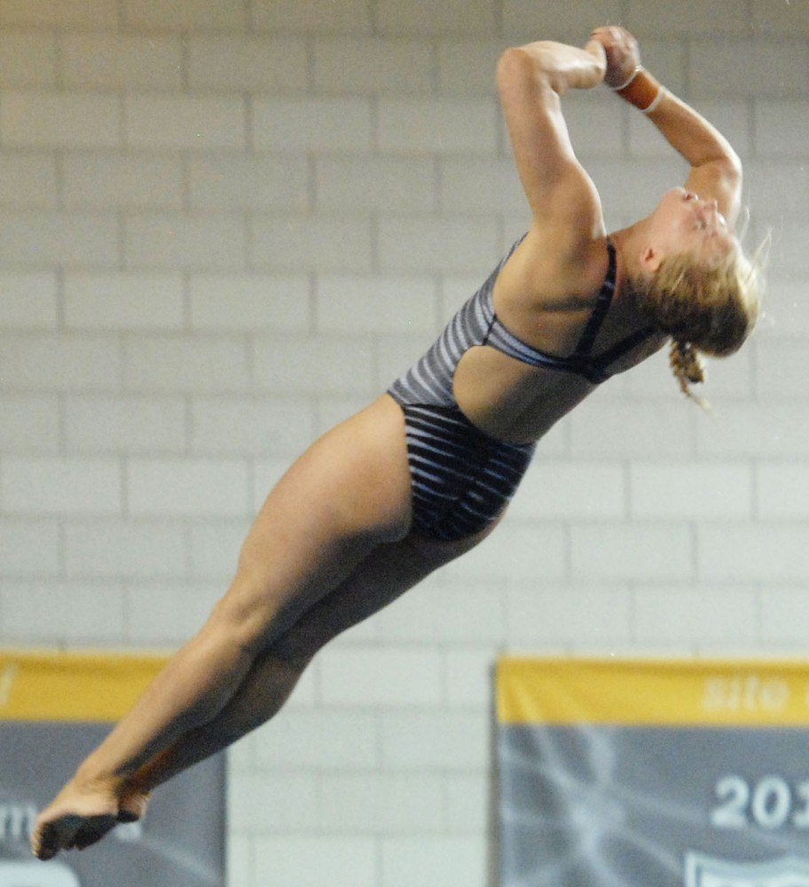 Minnesota diver Maggie Keefer dives from the high platform during the Big Ten Conference on Tuesday, Dec. 11, 2012, at the University Aquatic Center.