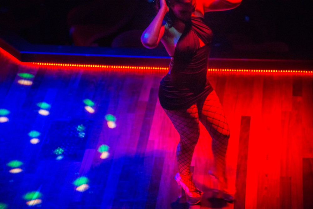 An adult entertainer dances onstage Tuesday night at The Seville, a club and cabaret in downtown Minneapolis.