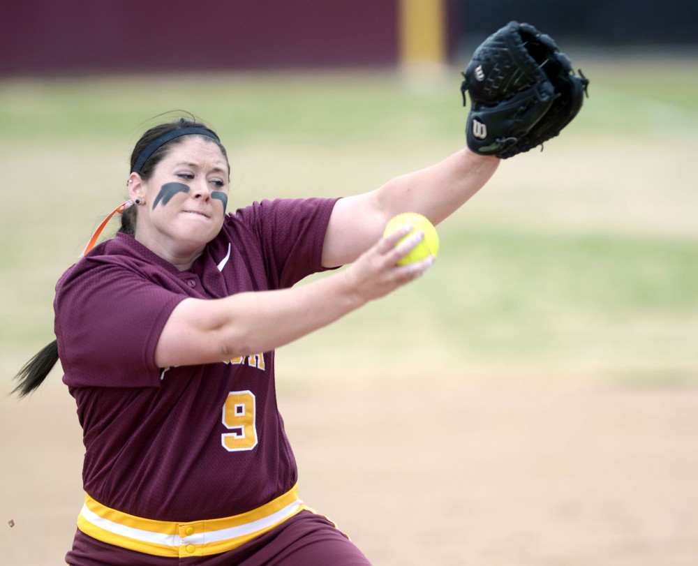 Minnesota pitcher Sara Moulton winds up to throw a pitch against Indiana on Saturday, May 4, 2013, at Jane Sage Cowles Stadium.