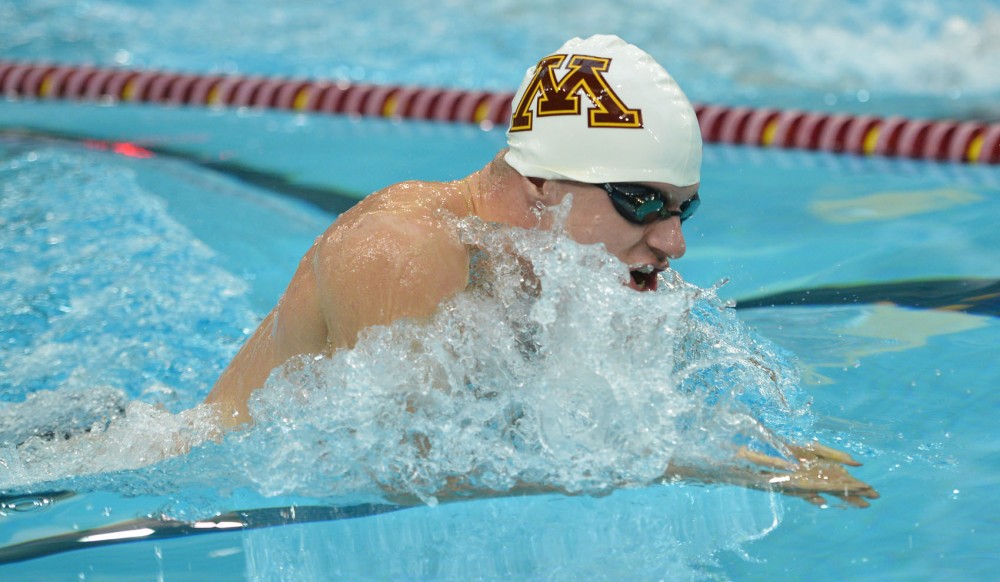 Minnesotas Derek Toomey swims in the mens 100-yard breaststroke during the Minnesota Challenge on Saturday, Feb. 9, 2013, at the University Aquatic Center. 
