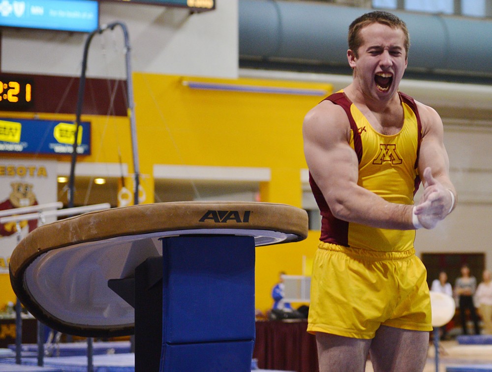 Zack Chase exclaims a shriek of joy after his vault performance on Saturday, Jan. 26, 2013, at the Sports Pavilion.
