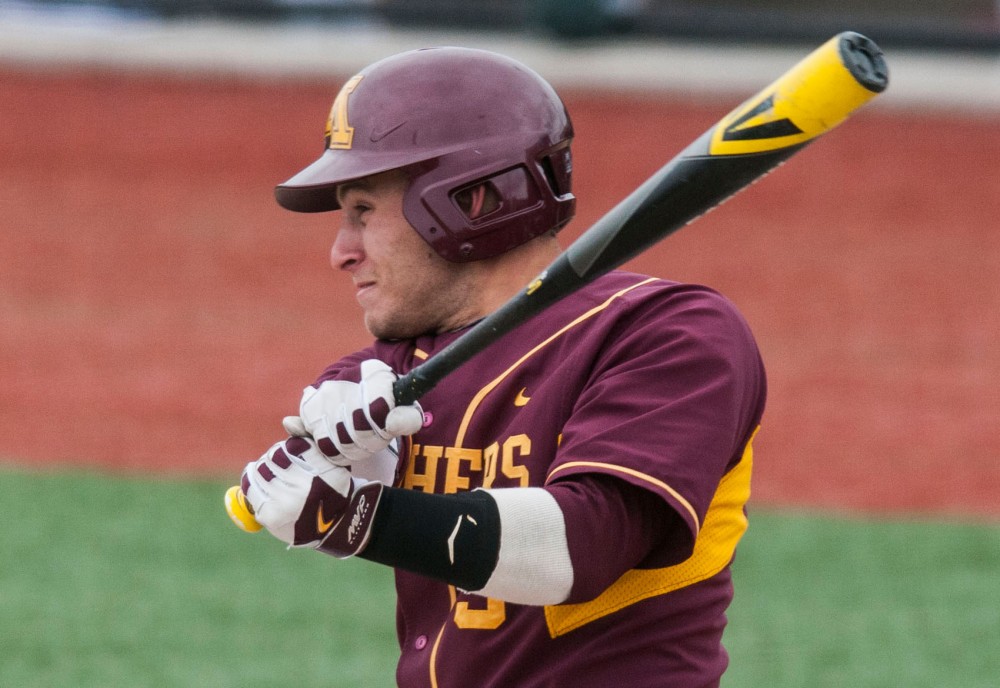 Michael Handel hits the ball during the baseball game against Nebraska on Sunday afternoon at Siebert Field.