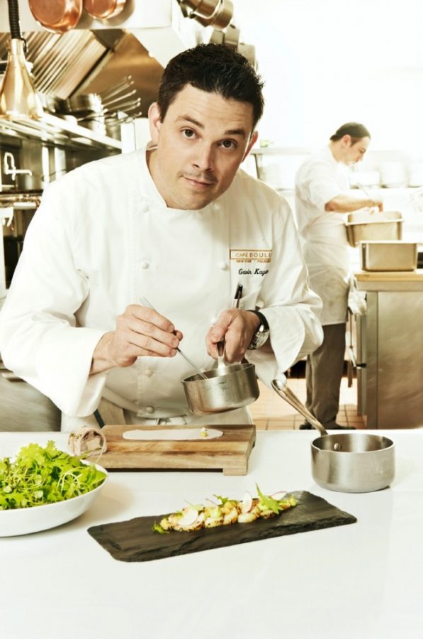 Chef Gavin Kaysen hams it up in the Cafe Boulud kitchen.