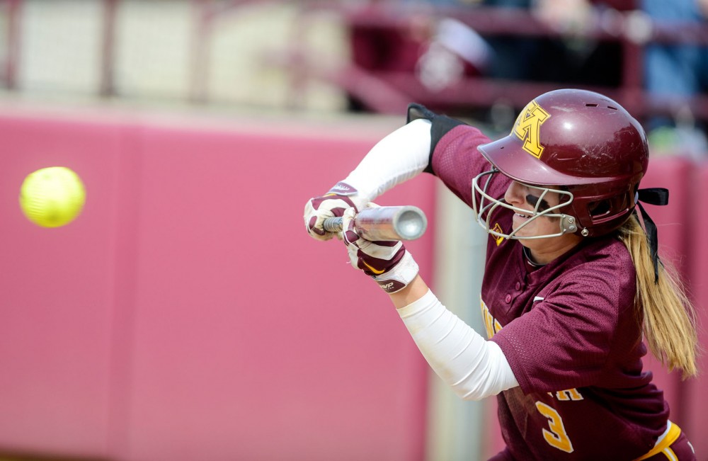 Minnesota junior Erica Meyer hits during the game against Penn State at the Jane Sage Cowles Stadium on Saturday. This game resulted in a 9-0 win for the Gophers. 