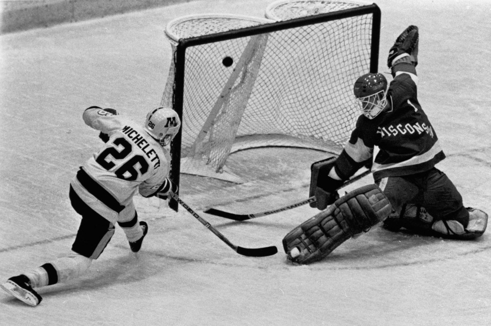Pat Micheletti scores a goal against Wisconsin. Micheletti will be inducted into the M Club Hall of Fame in October.