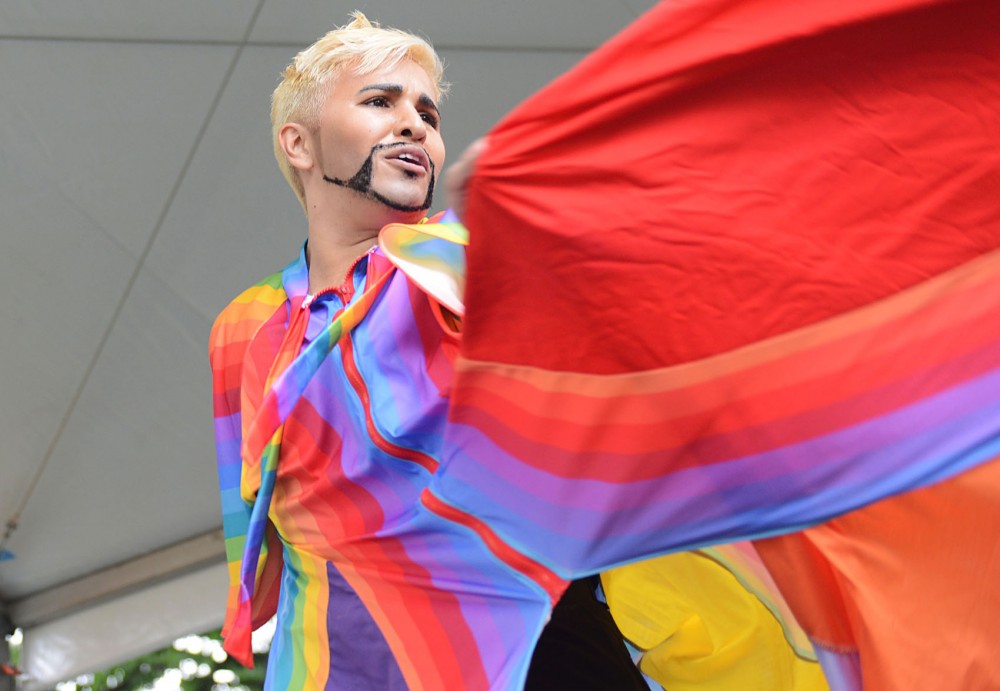 Performer Kamen Ader-Love lip syncs and dances on the Stonewall Stage at the Twin Cities Pride festival at Loring Park on Saturday. 