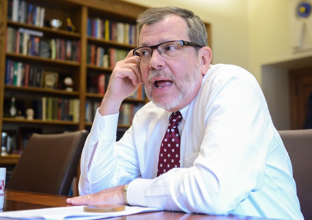 University President Eric Kaler voices his position on the lightrail, the smoking ban, and other campus issues during an interview in his office on Thursday. 