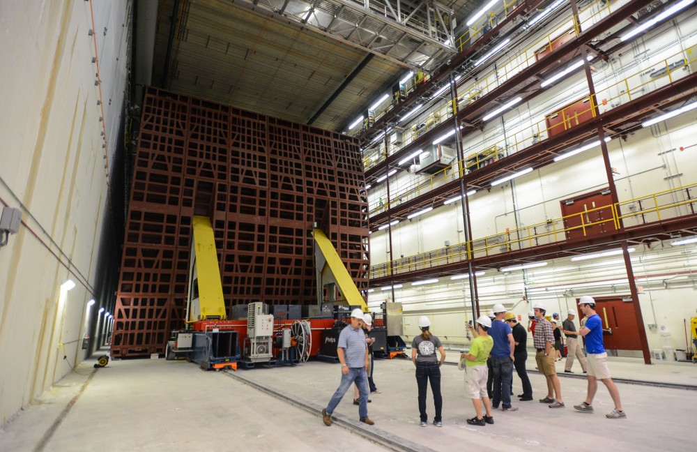Members of a tour group take photos while observing the world-class NOvA far detector Thursday afternoon in Ash River, Minn.  The 14,000-ton detector is one of the worlds largest free-standing plastic structures. 