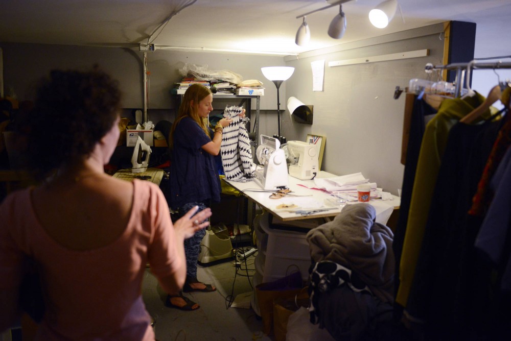 Kimberly Jurek founder of Kjurek works on a piece for the  upcoming fashion show Envision 2014 at Showroom in Minneapolis. 
