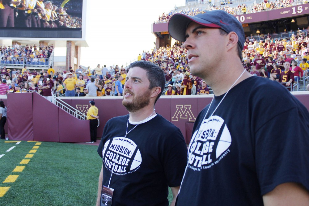 Mike Fulton and Seth Vander Tuig watch from the sidelines as the Gophers take on Middle Tennessee at TCF Bank Stadium on Saturday. 
