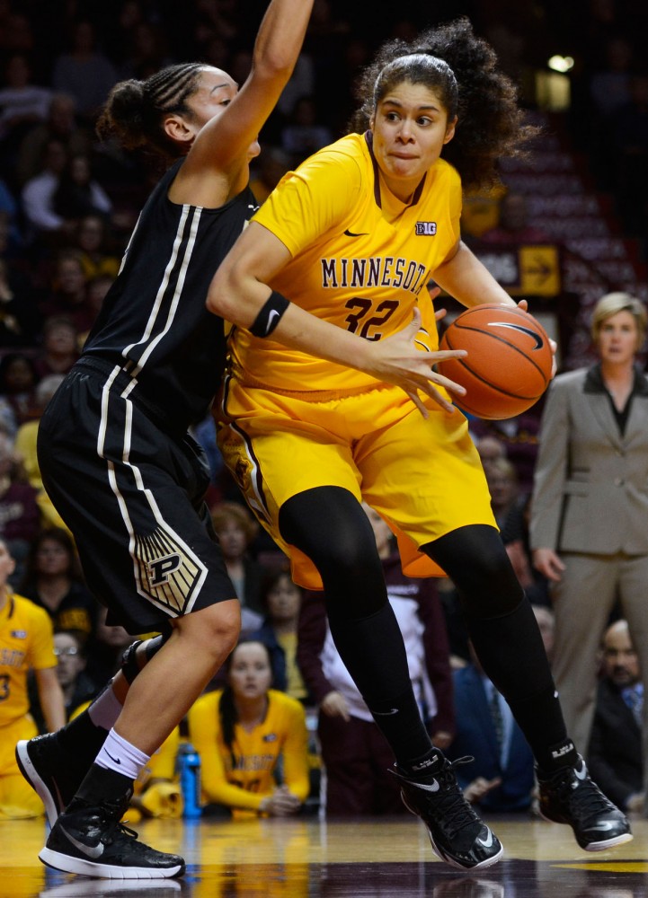 Gophers guard Amanda Zahui B. runs the ball past Purdue at Williams Arena on Thursday. Purdue beat out Minnesota by 2 points in overtime, with a final score of 90-88.