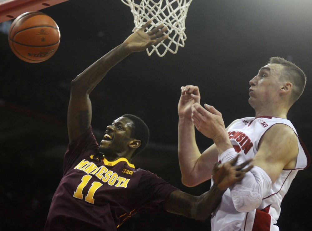 Minnesota guard Carlos Morris shoots the ball in the first half against the Badgers on Saturday in Madison, Wis. 