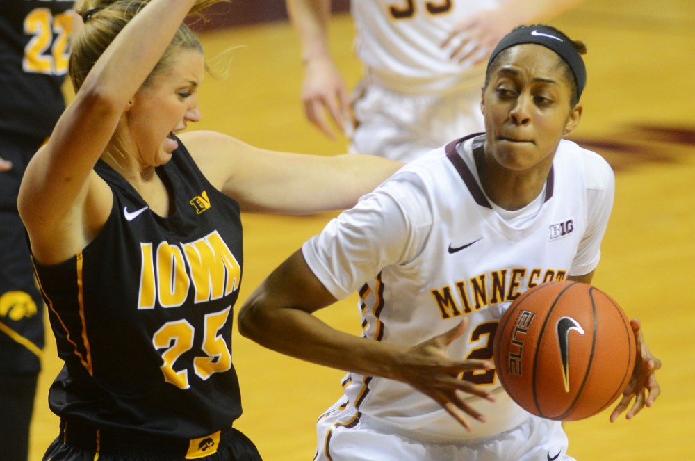 Forward Shae Kelley holds on to the ball against the Hawkeyes on Feb 17 at Williams Arena.
