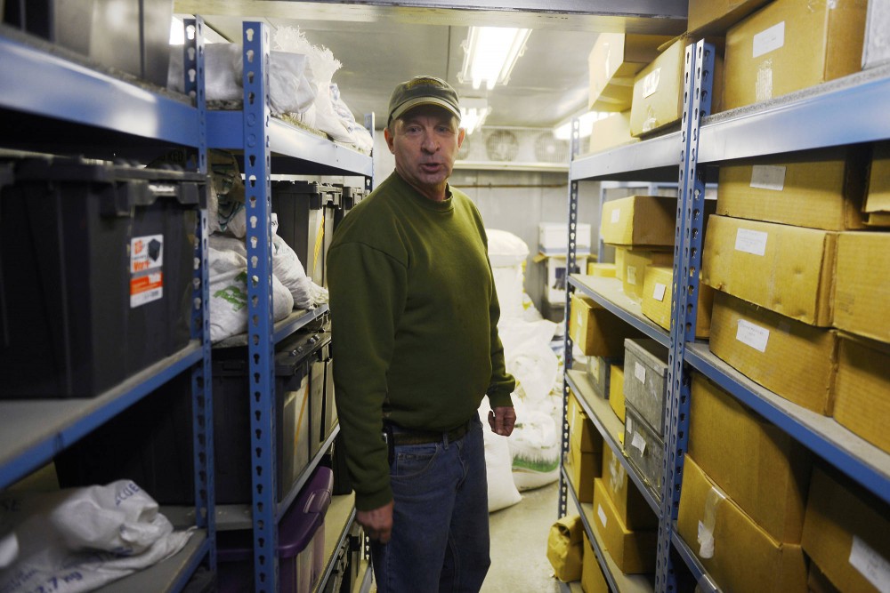 Facility manager Roger Meissner stands inside of a refrigerated seed storage unit in the Plant Growth Facility on the St. Paul campus on Wednesday morning. Seed libraries would be structurally similar to a refrigeration unit like this one.
