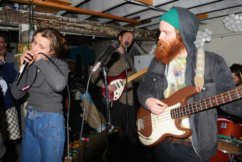 Miami Dolphins members Beth Bambery, Patrick Larkin and Ronnie Lee play a house show in a Minneapolis basement on Saturday. The band will play a show at the Triple Rock Social Club on Wednesday, March 4. 