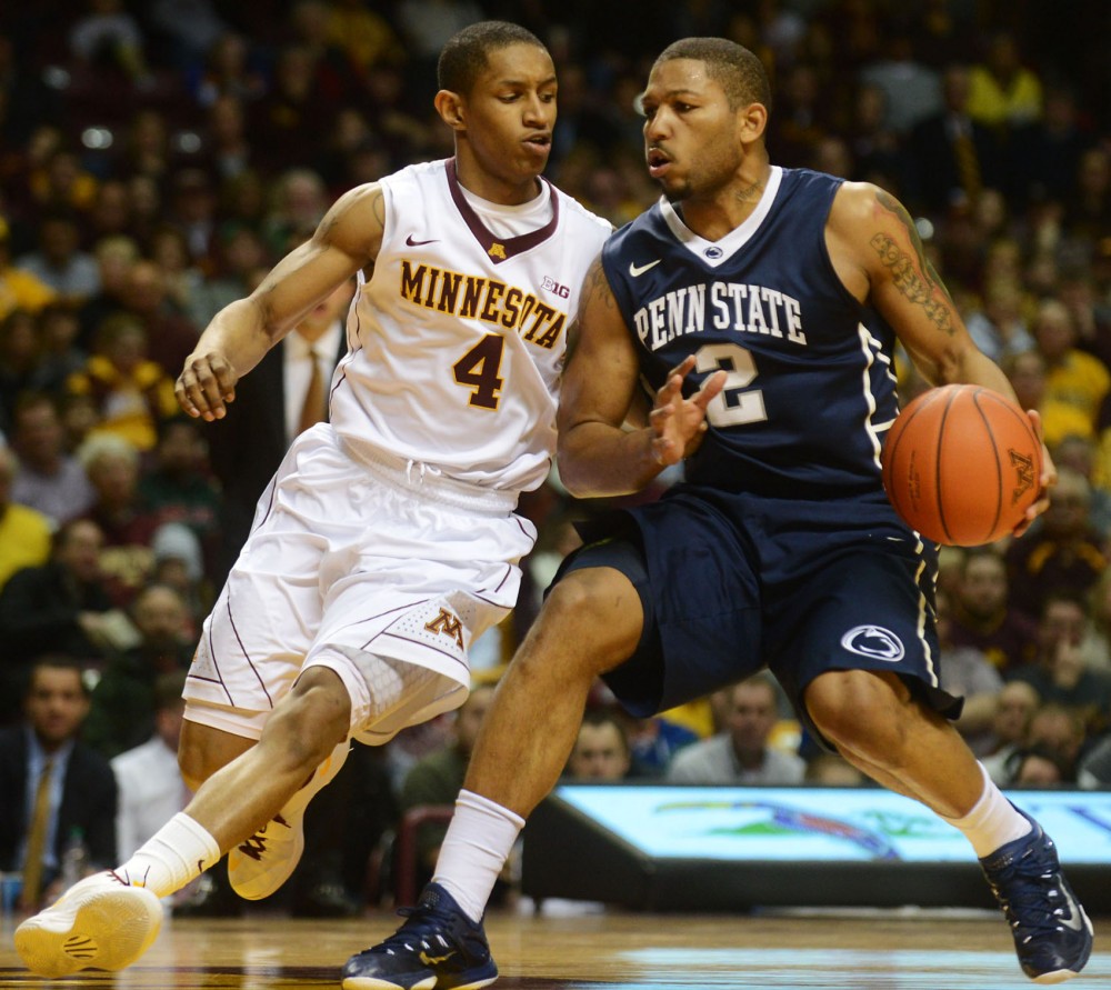 Minnesota guard DeAndre Mathieu defends Penn State guard D.J. Newbill in the first half at Williams Arena on Sunday. 