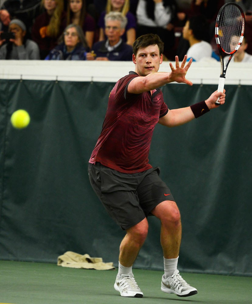Senior Leandro Toldeo volleys the ball at the Baseline Tennis Center on March 6 against Washington.