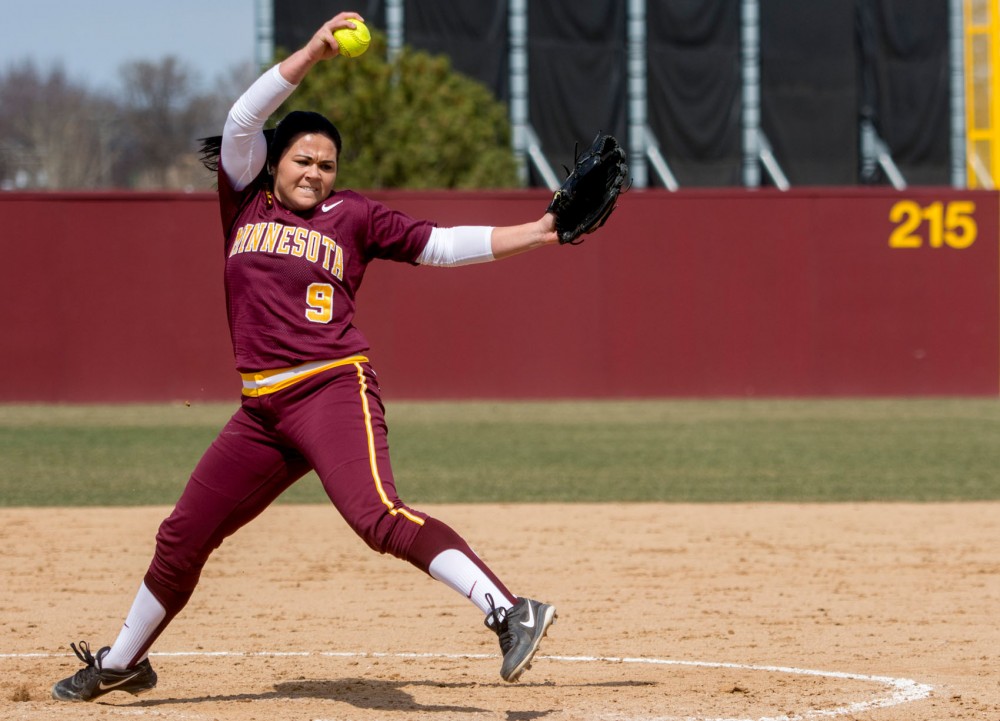 Freshman Kylie Stober delivers a pitch at Jane Sage Cowles Stadium on April 4.