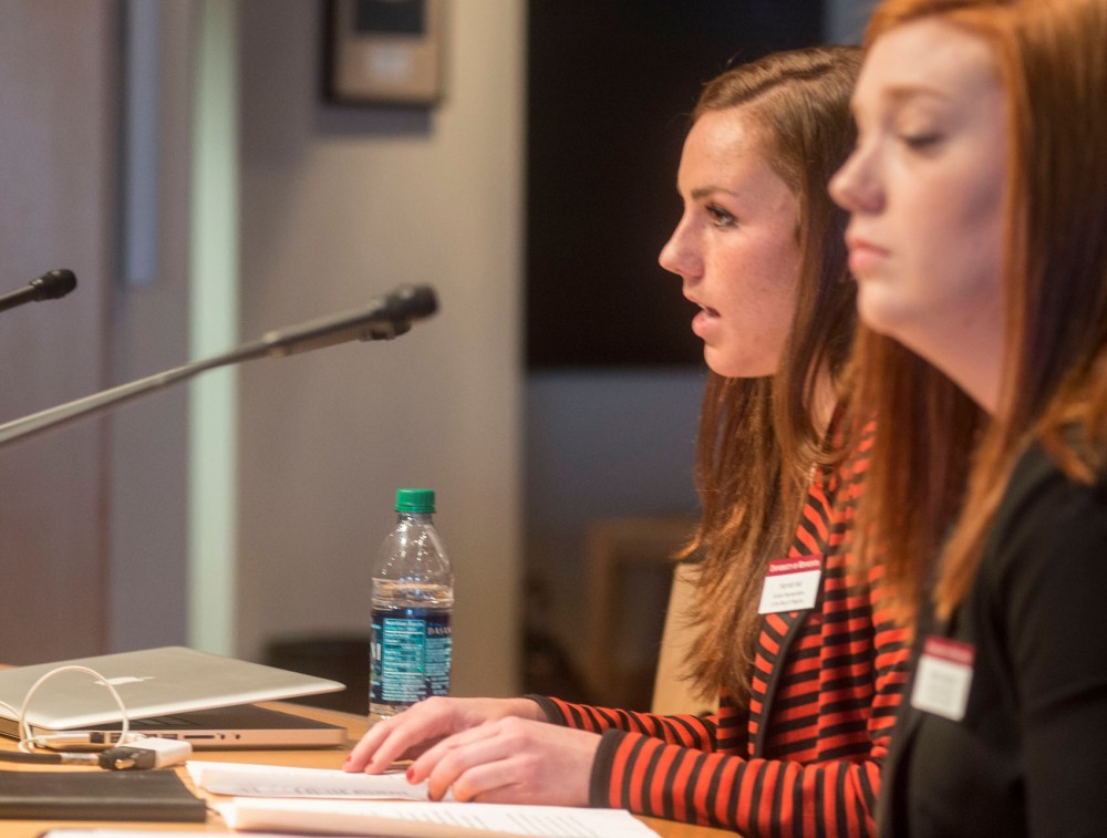 Chair and vice chair of the Student Representatives to the Board of Regents Hannah Keil and Callie Livengood present their report to the board at McNamara Alumni Center on Friday morning. 