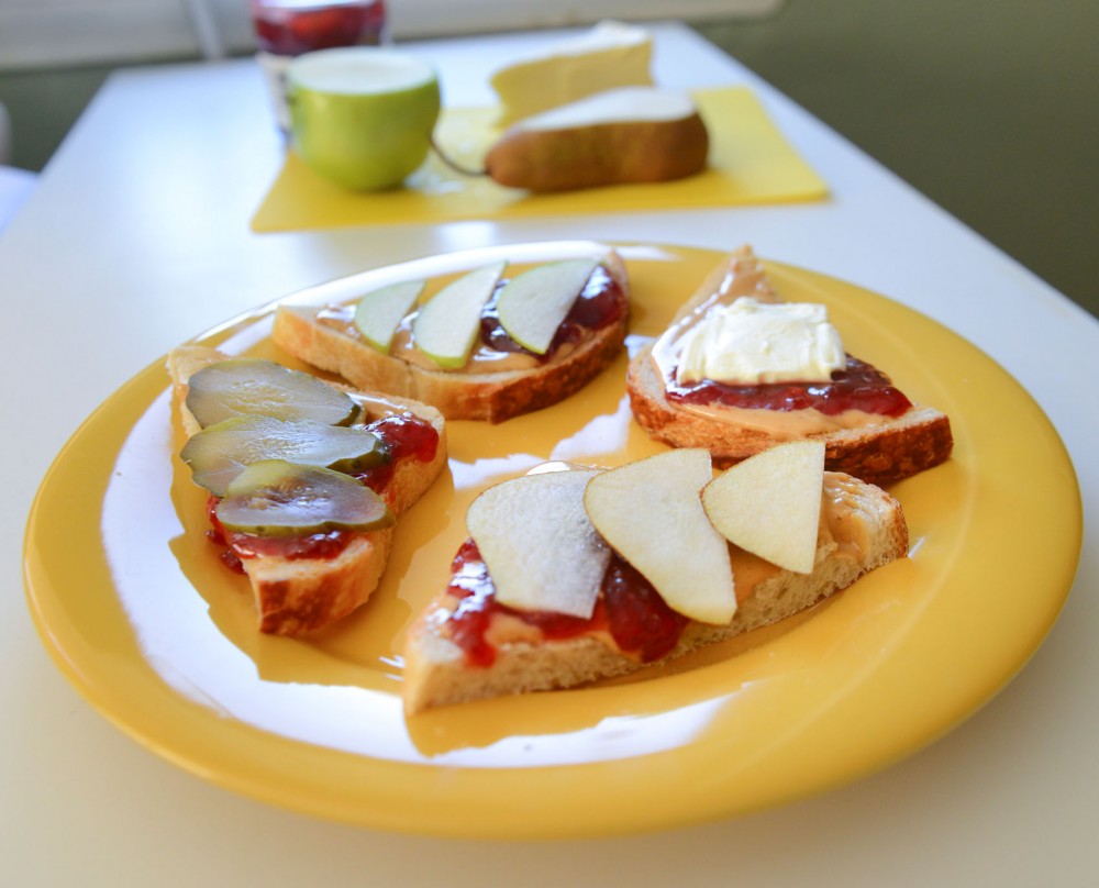 Updated versions of the classic PB&J make for a zestier take on lunchtime. Adding pickles, apples, pears, or brie cheese are just a few ways to enhance your sandwich. 