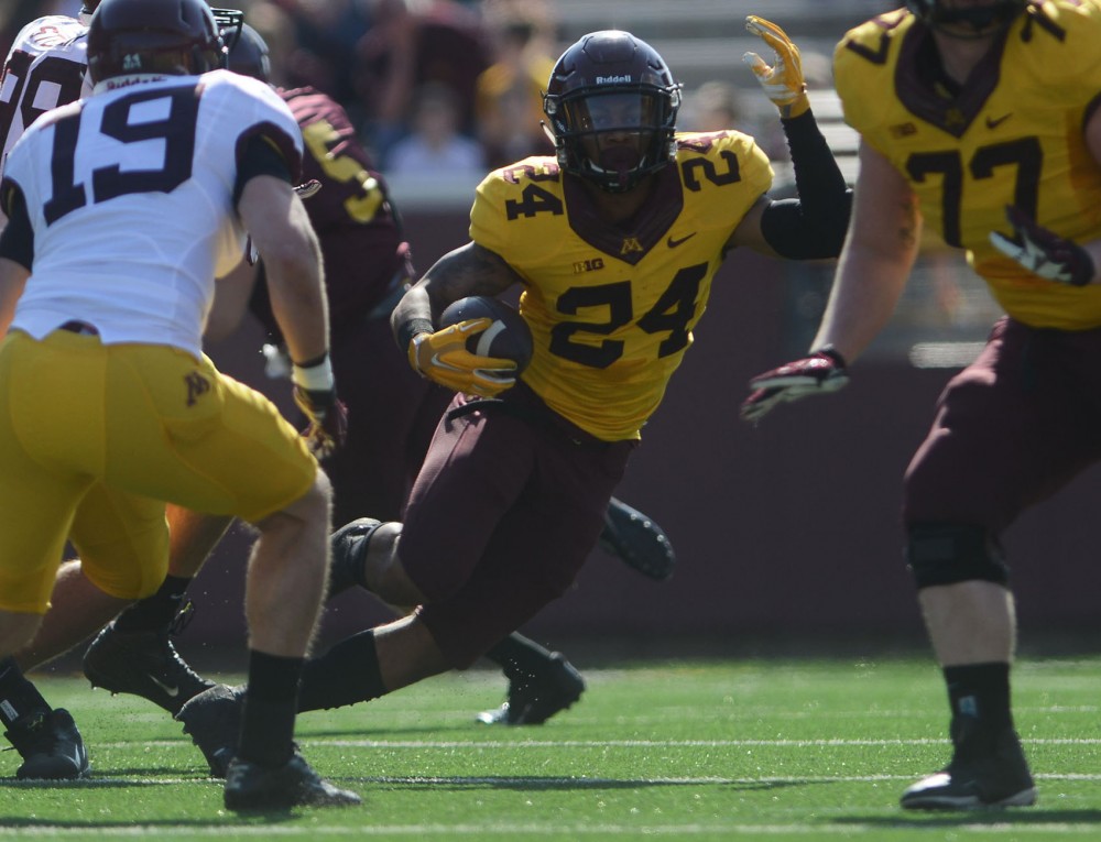 Minnesota running back Rodney Smith runs the ball during the spring game on Saturday at TCF Bank Stadium. 