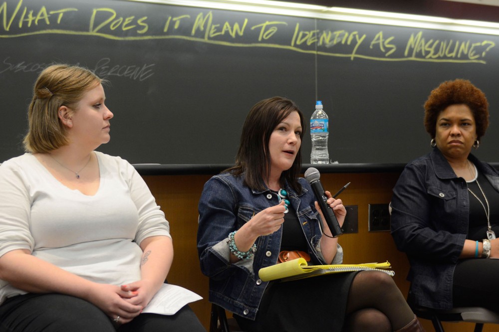 Panelist Lindsay Gullingsrud, center, discusses masculinity at the Tate Lab of Physics on April 14, 2015, as part of an event to help the campus community understand what may cause sexual violence.
