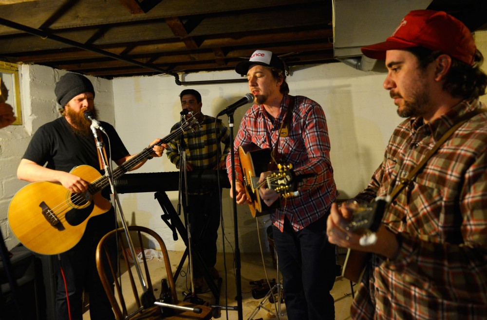 Members of local bluegrass band Thirsty River rehearse in Minneapolis on Wednesday. The band will be performing at their CD release show at Icehouse on Friday, April 17.