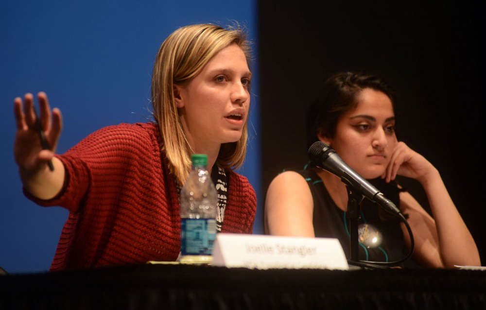 Minnesota Student Association presidential candidate Joelle Stangler talks about her visions for the student groups future at the election debate at Coffman Memorial Union on April 8. Stangler was elected MSA president on Saturday. 