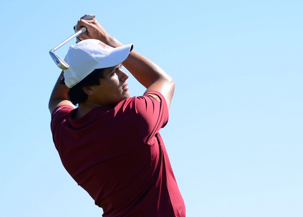 Sophomore Jose Mendez swings at Windsong Farm Golf Club on Sept. 7, 2014, at the Gopher Invitational. 