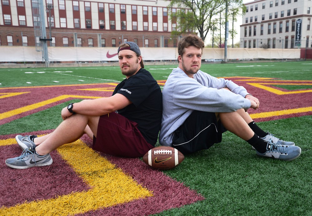 Brothers and Gopher football players Matt, left, and Mitch Leidner pose at the Gibson Nagurski Football Complex on Friday.