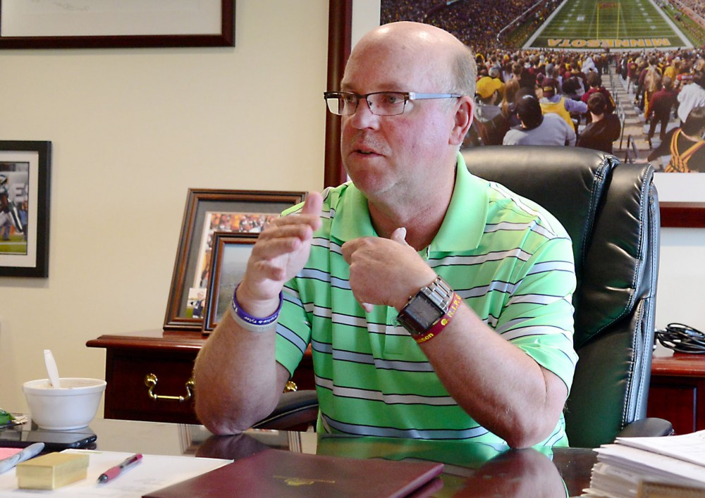 Head Coach Jerry Kill discusses his past four coaching years in his office on Monday.