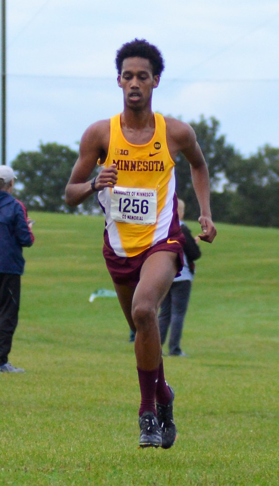 Sophomore Obsa Ali approaches the finish line of the Oz Memorial race at Les Bolstad Golf Course on Sept. 11, 2015.