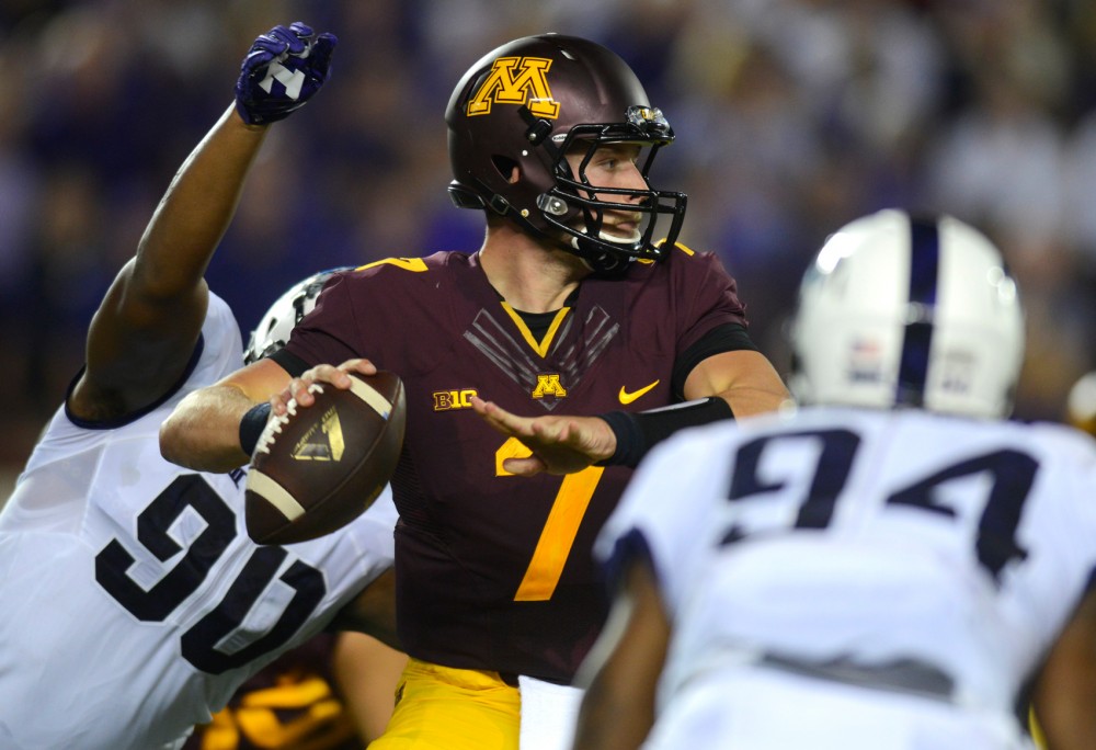 Minnesota quarterback Mitch Leidner faces pressure from Texas Christian University on September 3, 2015. The Gophers played against Colorado State University on Saturday where they won 23-20.