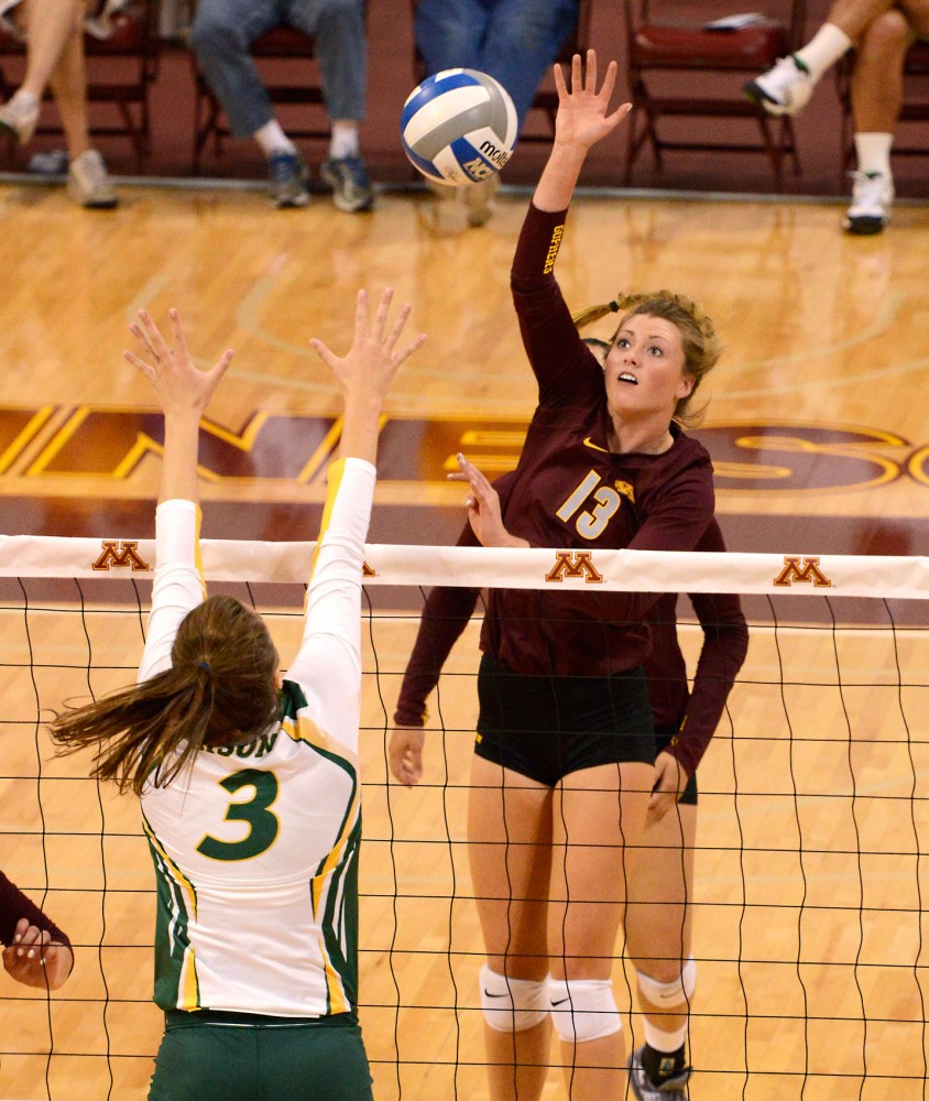 Sophomore Molly Lohman strikes the ball at the Sports Pavilion on Saturday morning where the Gophers defeated North Dakota State University.