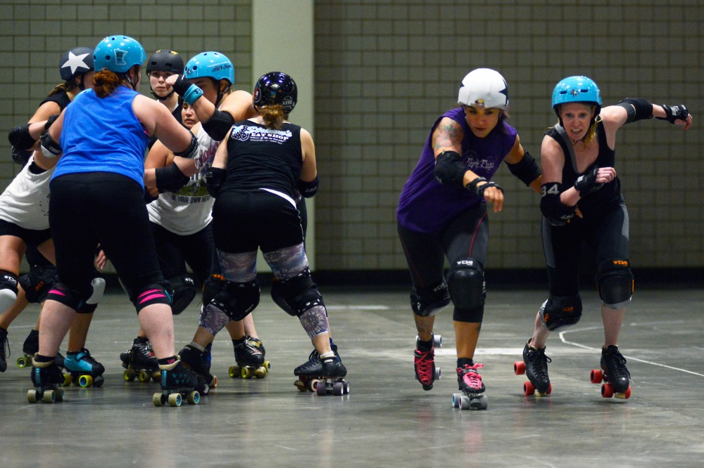 Members of the Minnesota Rollergirls participate in a league-wide scrimmage on Tuesday, Sept. 29. The Minnesota Rollergirls season debut is Saturday at the Roy Wilkins Auditorium in St. Paul.