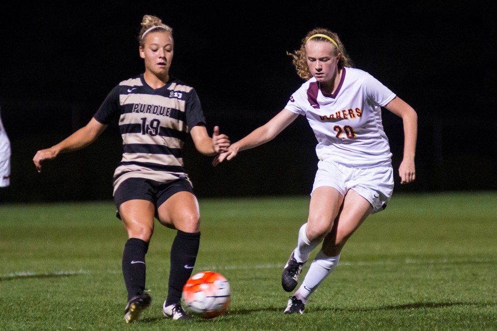 Gophers forward April Bockin fights for the ball against Purdue at Elizabeth Lyle Robbie Stadium, September 25, 2015
