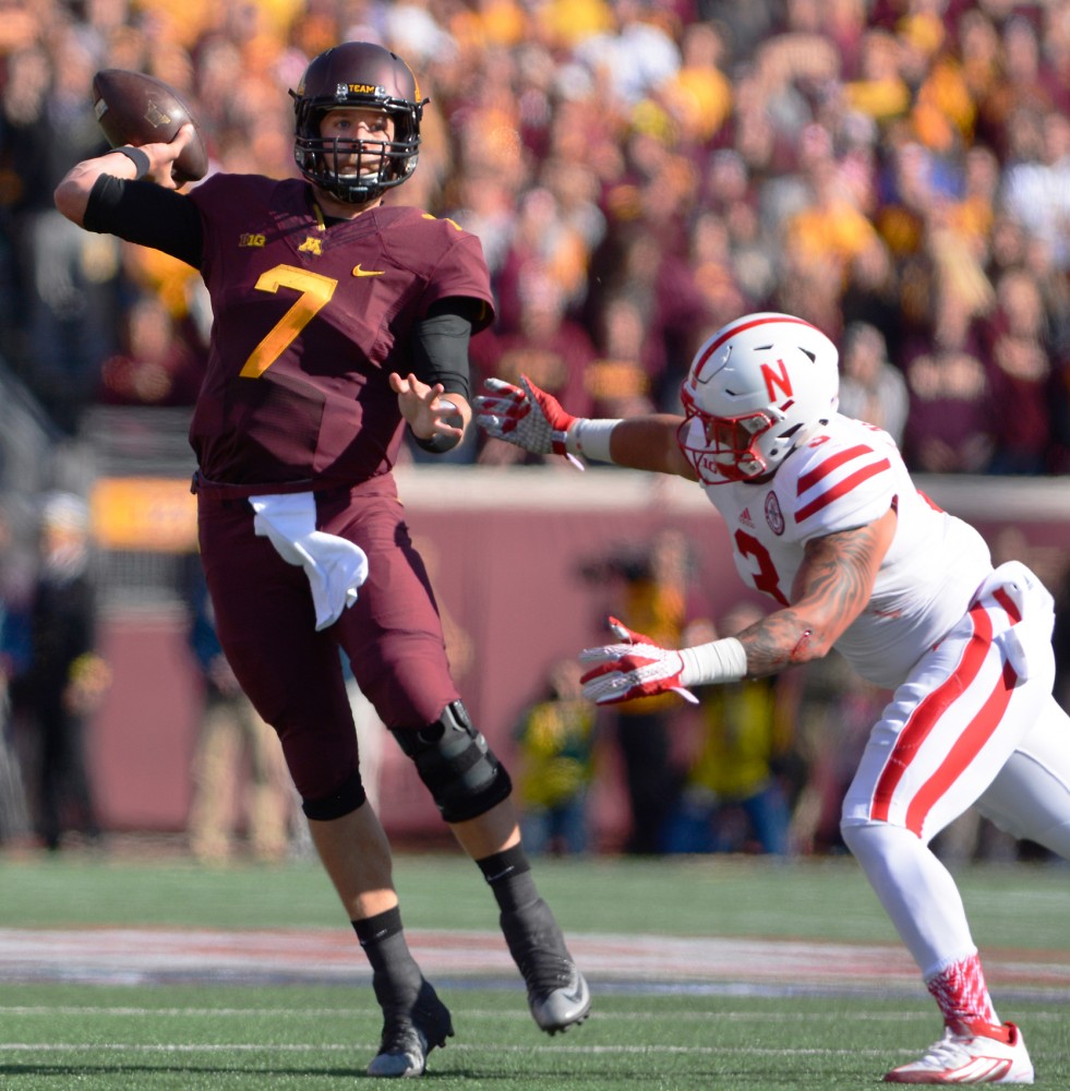 Quarterback Mitch Leidner throws a pass to make Gophers first touchdown of the game at TCF Bank Stadium Saturday where Minnesota fell to the Nebraska Cornhuskers 48-25.